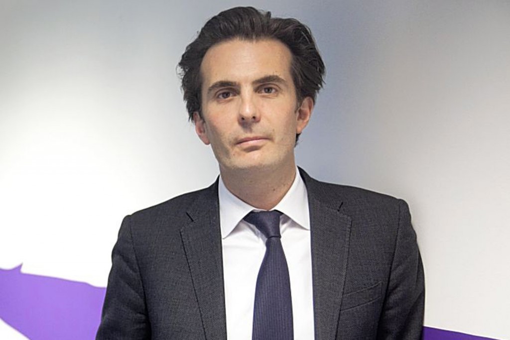 Yannick Bollore, director general and vice president of Havas SA, poses for a photograph at the company's headquarters in Paris, France, on Friday, Dec. 14, 2012. Havas SA, the French advertising company which is known for memorable advertising campaigns, including the 2009 commercials for Evian water that featured babies on roller skates. Photographer: Balint Porneczi/Bloomberg *** Local Caption *** Yannick Bollore