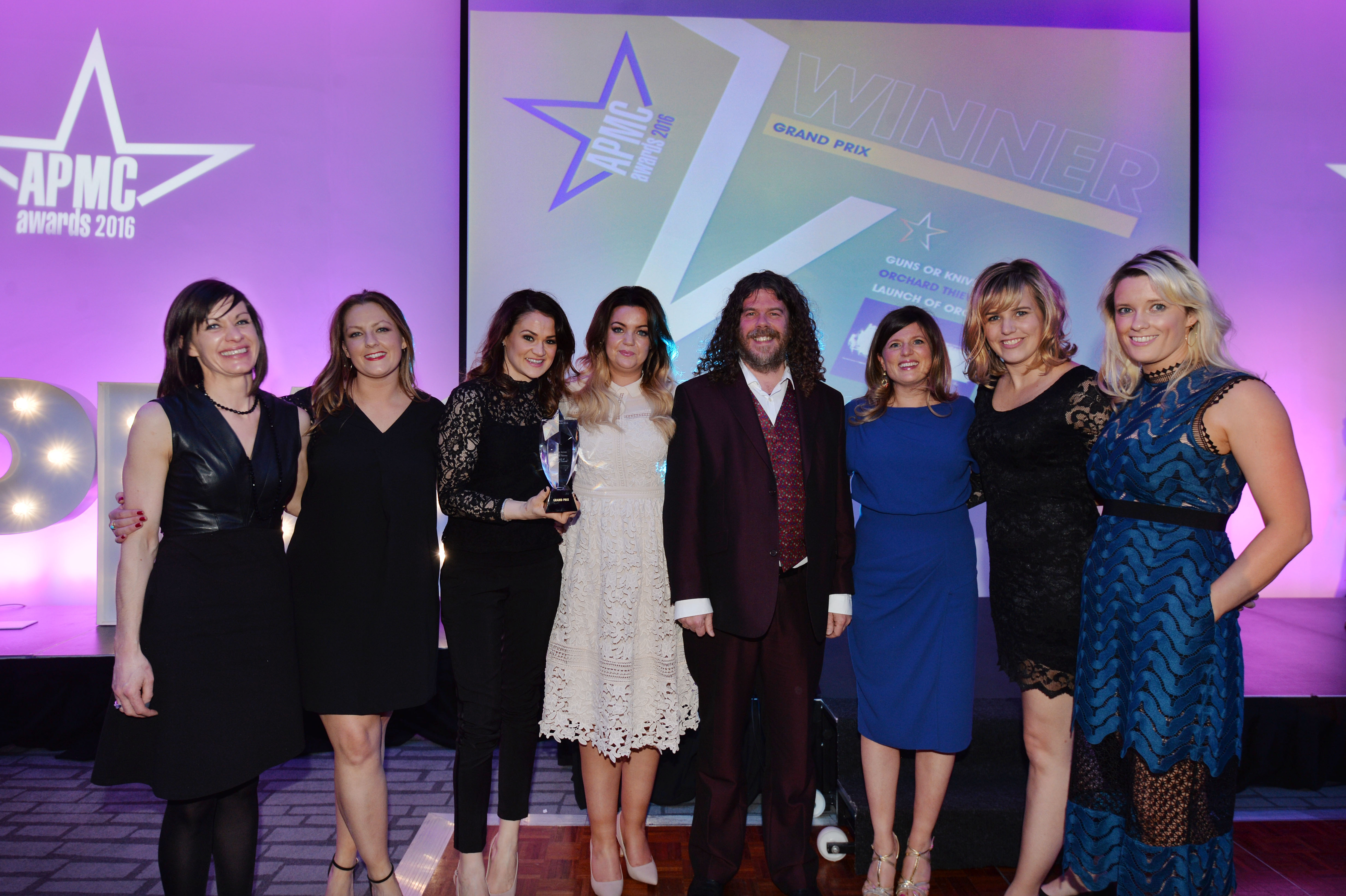 REPRO FREE Images 022 Garry Munns (Centre) Chairperson of the APMC Judging Panel presenting the 2016 Grand Prix and overall best promotional marketing campaign at the APMC Star awards 2016 to Paula Conlon (Orchard Thieves), Roisin Field, Heidi McCaughey(Orchard Thieves), Kerrie Sweeney, Heather Judge, Hanne Villadsen, and Zara Flynn from Guns or Knives for Orchard Thieves Launch at the Association of Promotional Marketing Consultants APMC Star Awards 2016 in the Marker Hotel on Friday 15th April 2016.